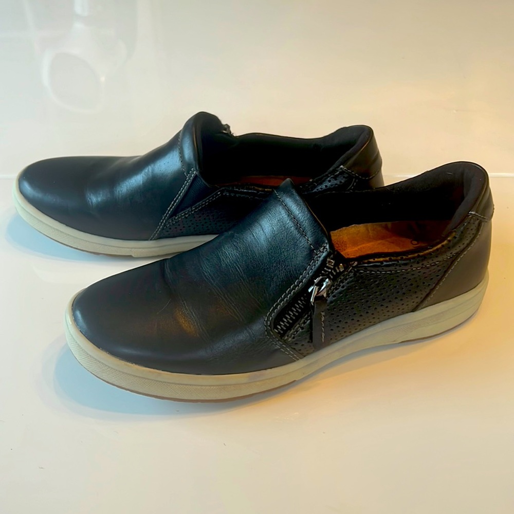 Versatile black leather slip on shoes